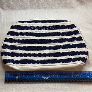 Oscar de la Renta make up bag.